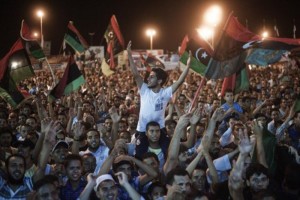 Libyans celebrated as the end of Qaddafis regime seemed near. [Gianluigi Guercia/AFP]