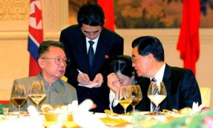 North Korean leader Kim Jong Il (left) confers with Chinese leader Hu Jintao