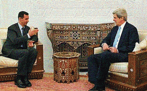 John Kerry and Bashar al-Assad in better times.