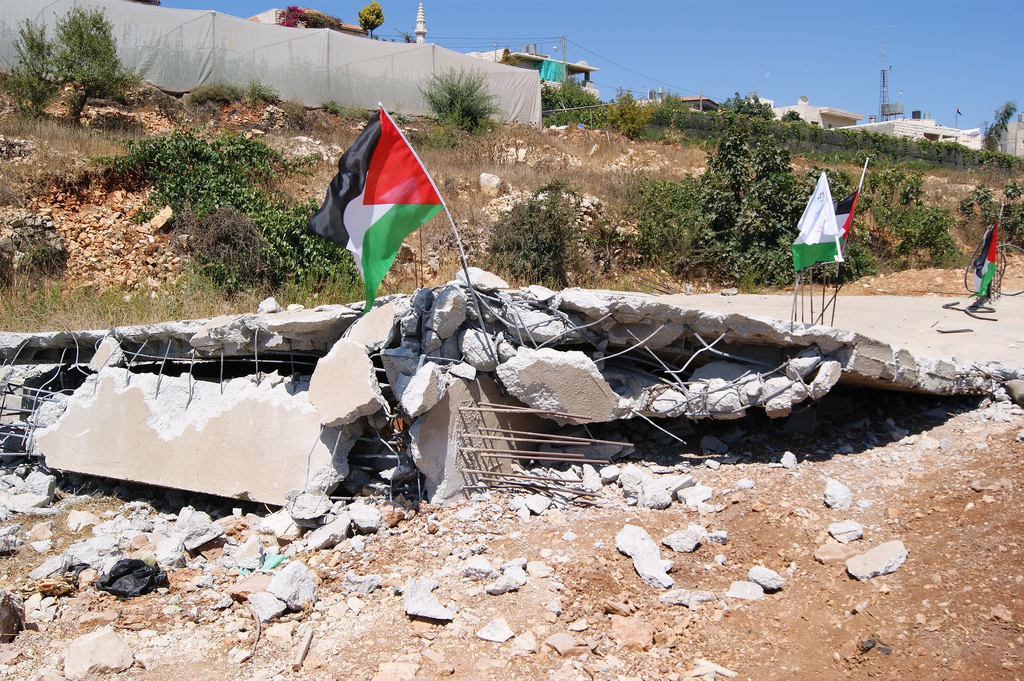 A bulldozed Palestinian home in the village of Beit Ommar. (Source: Palestine Solidarity Project / Flickr)