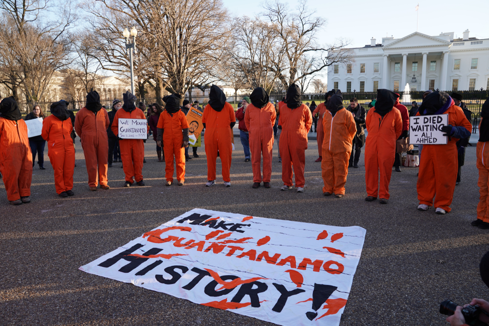 Members of the group Witness Against Torture protest against the Guantanamo Bay prison outside the White House, 2019. (Shutterstock)