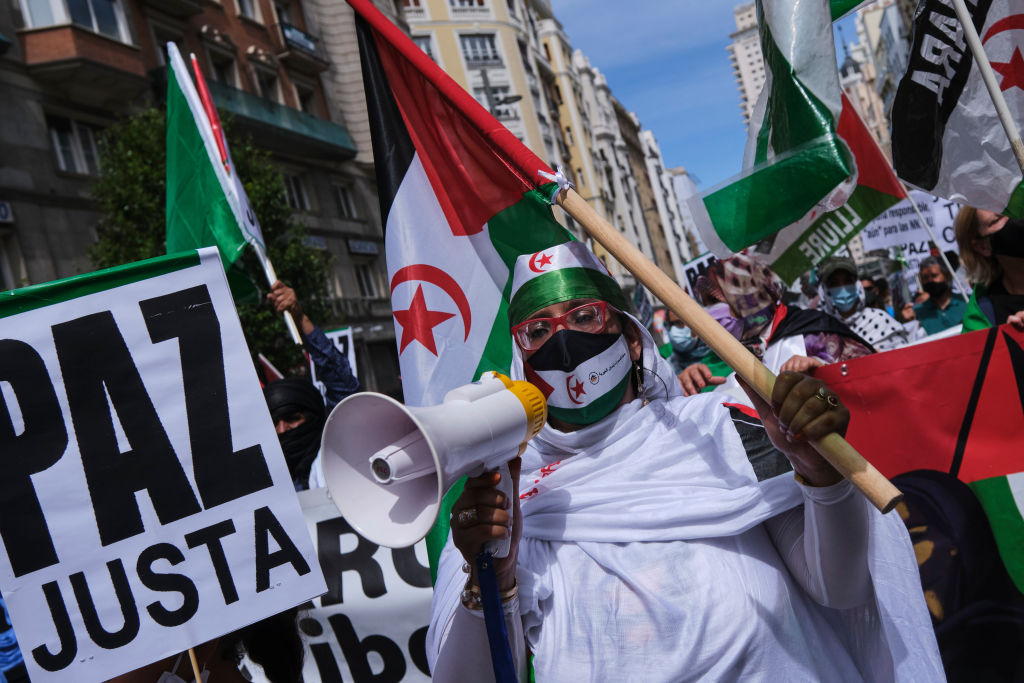 A Sahrawi solidarity march in Madrid, Spain in June 2021 (Getty) MADRID, SPAIN - JUNE 19: A Sahrawi woman chants during a march in central Madrid in support of Western Sahara on June 19, 2021 in Madrid, Spain. The march, which arrived in Madrid on June 18, has travelled more than 3,000 kilometers from different parts of Spain, calls on the Spanish government to respect international rule of law and human rights in Western Sahara. (Photo by Xaume Olleros/Getty Images)