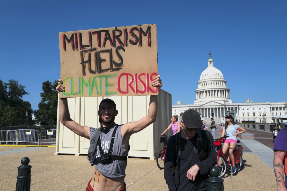 U.S. veterans protest the military's contribution to climate change outside the U.S. Capitol, August 2022