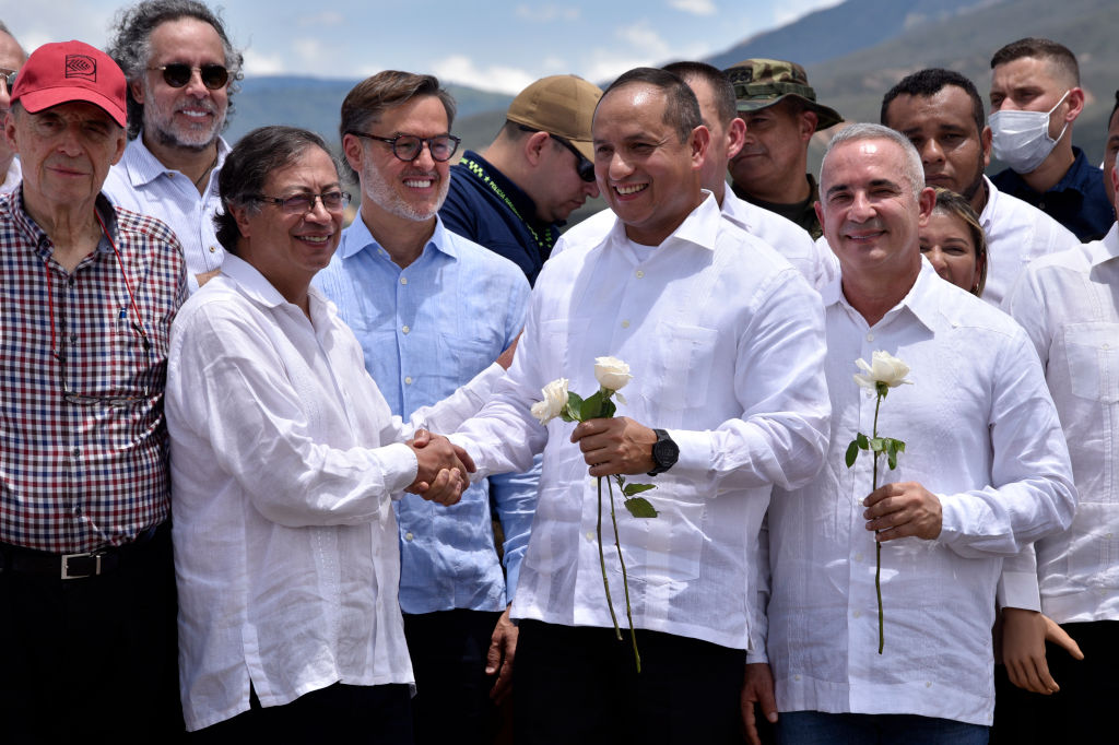 Colombian President Gustavo Petro celebrates the re-opening of the Colombia-Venezuela border with Venezuelan officials, September 2022. (Shutterstock)